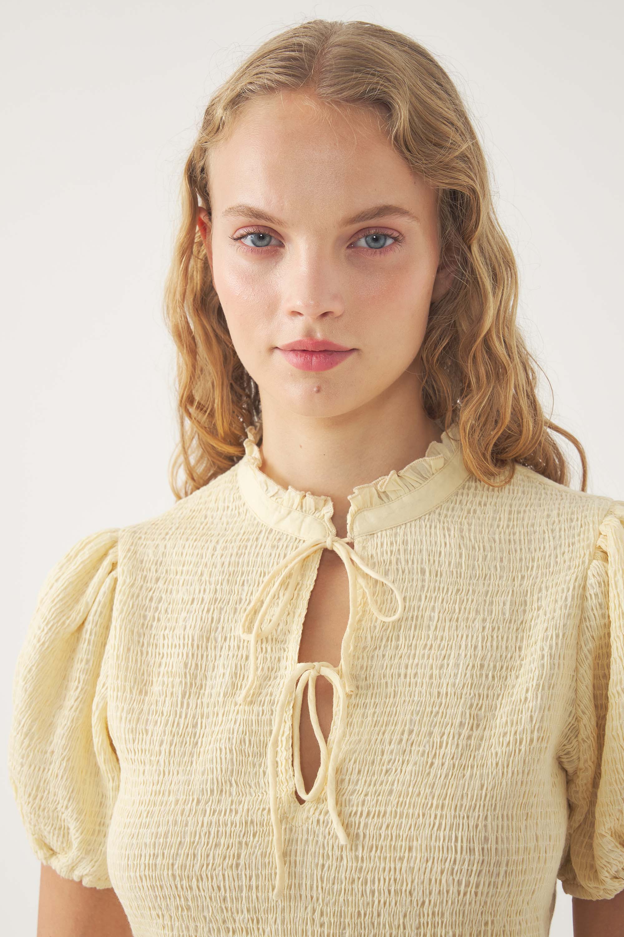 Blusa con smock Angelo